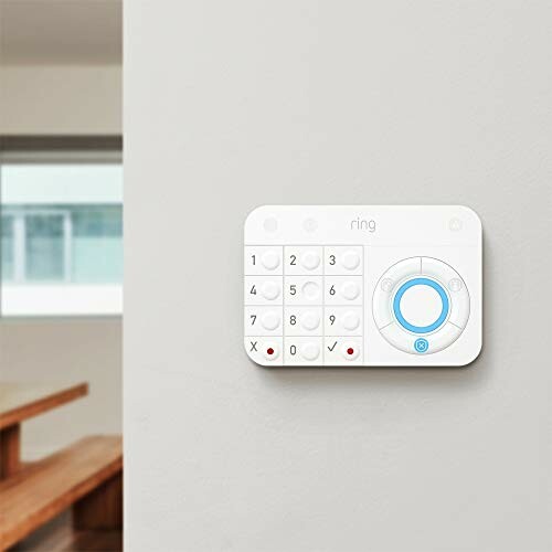 Ring alarm keypad mounted on a wall.