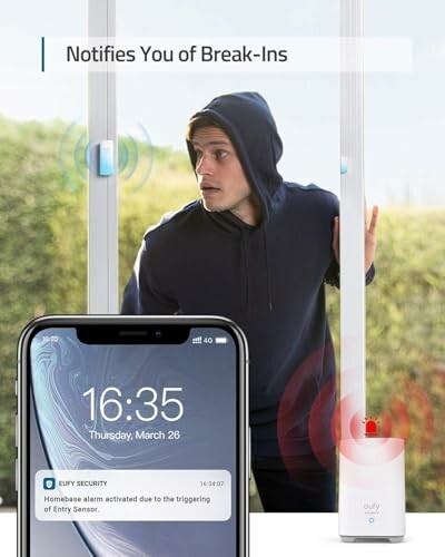 Person attempting to break in with phone showing security alert.