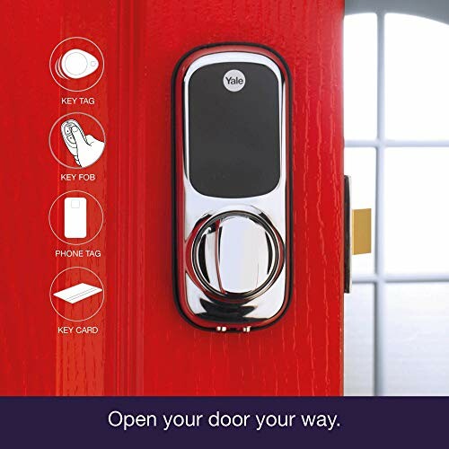 Smart door lock with keyless entry options on red door