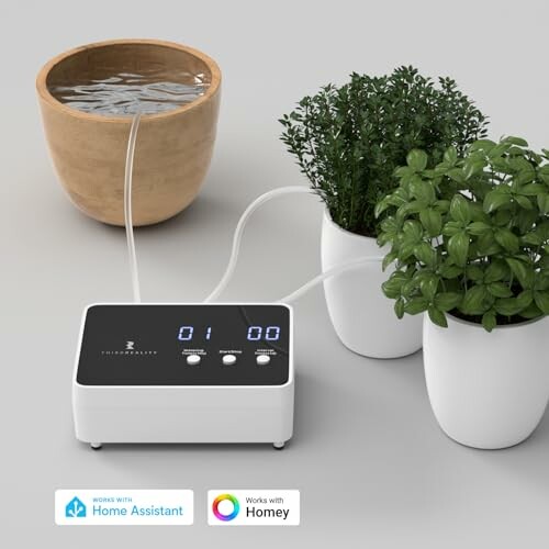 Smart plant watering system with two potted plants and digital timer.